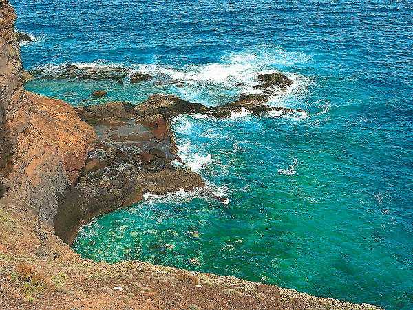 A view down the cliffs on the island of Gomera, on the Canaries Archipelago. —photo by David Henry