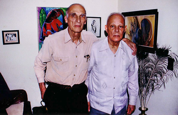 Franck et Paul Laraque chez Paul en 2004.