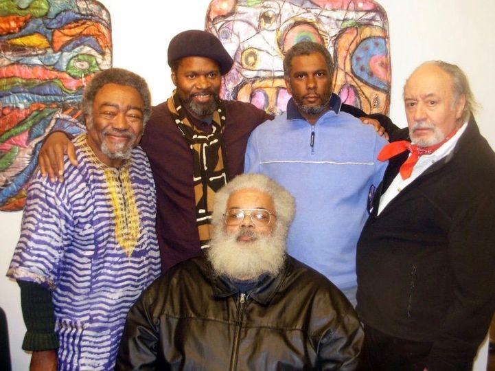 Askia Touré, Tontongi, Neil Callender, Aldo Tambellini, and (seated) Gary Hicks at an art gallery in Cambridge, MA, in 2009.