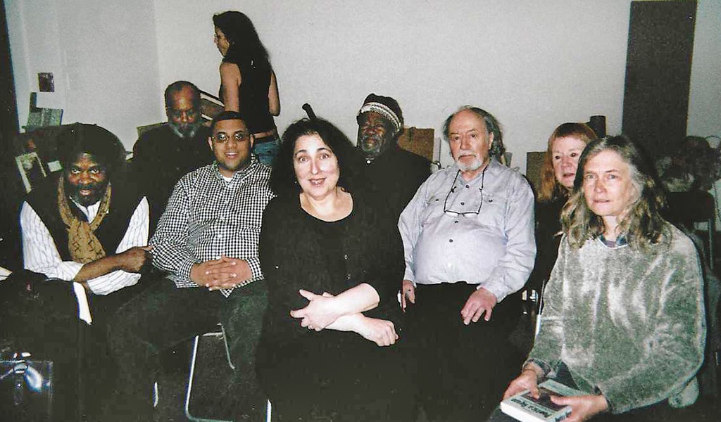 Tontongi, Ali Al-Sabbagh, Everett Hoagland, Heide Hatry, Jill Netchinsky, Askia Touré, Aldo Tambellini, Anna Wexler, and Sydney Mourray at the Pierre Menard Gallery in Harvard Square, Cambridge, 2010.
