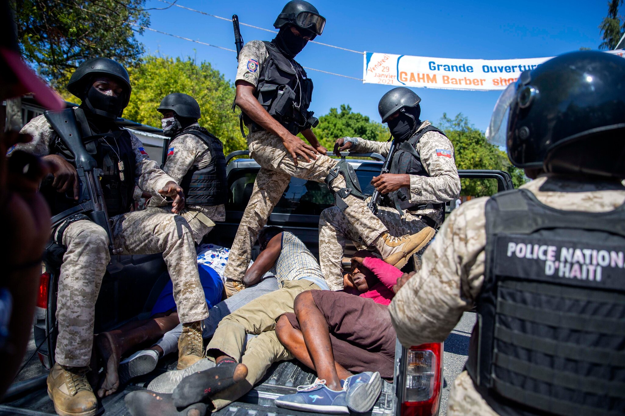 Officers intervene during a demonstration calling for president Jovenel Moïse’s resignation.