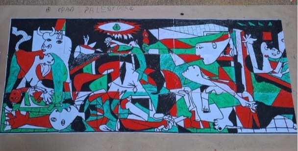 Picasso’s painting “Guernica” repainted in the colors of Palestine by Spanish students.